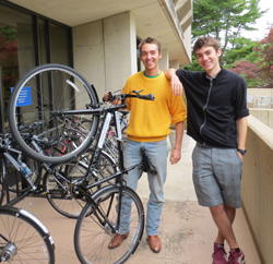 Spokespeople president Tristan Cole '13 and Spokespeople mechanic Jules Tamagnan '16 pose with one of the new bicycles available for rent through the library.