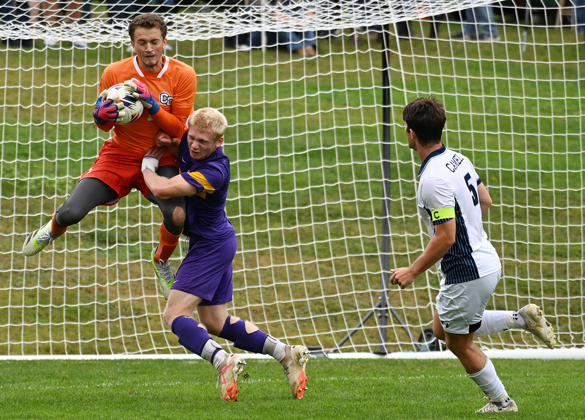 Goalie Peter Silvester '25 makes a save vs. Williams College in NESCAC men’s soccer action on Freeman Field.